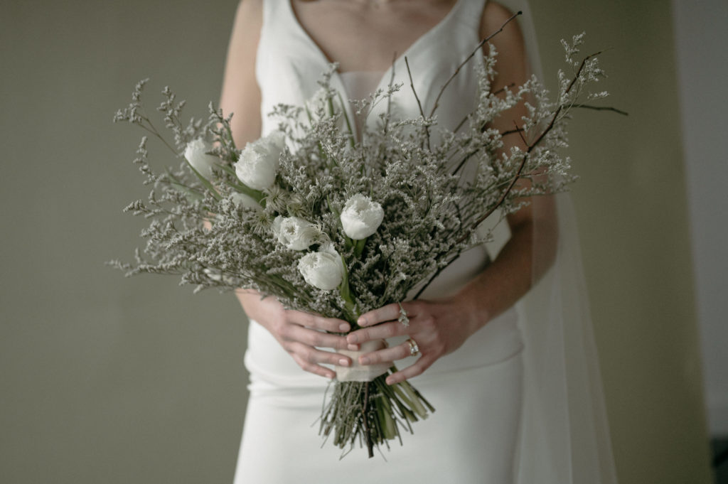 Lane and Kate engagement ring and Fielden Fluer flowers for editorial bridal