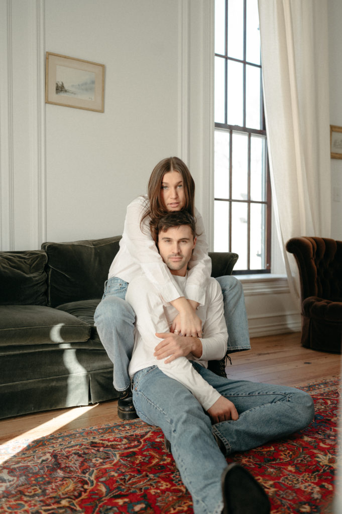 Couple relaxing on a couch at their couples studio session in Nashville, Tennessee