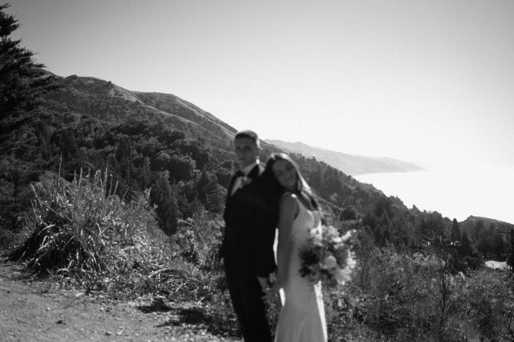 Black and white portrait of couple on the coast of Big Sur 