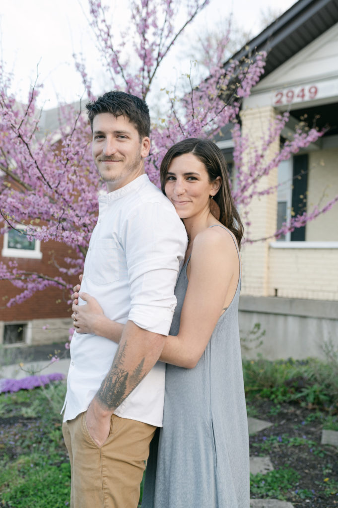 Couple smiling in front of their home in Cincinnati, Ohio