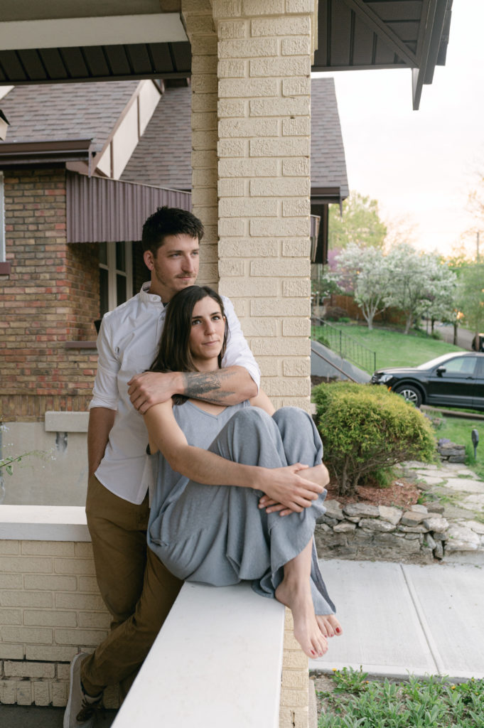 Portrait of couple on their front porch in Cincinnati 