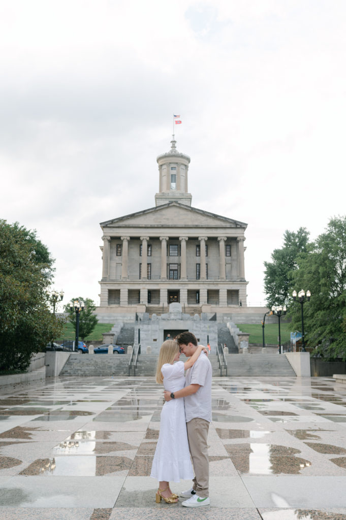 Couple posing in front of the Capitol Building downtown Nashville 
