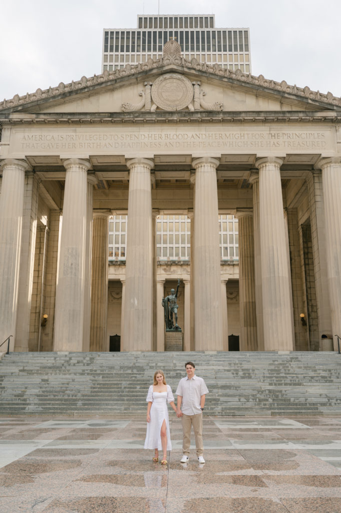 Bride and groom posing in front of The War Memorial Building in Nashville, Tennessee 