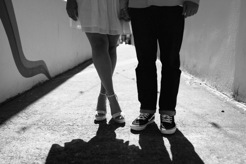 Black and white image of couples shoes 