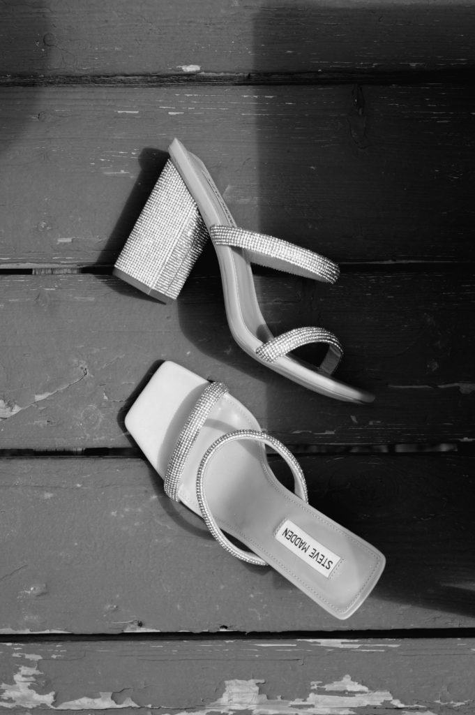 black and white image of brides sparkle heals 