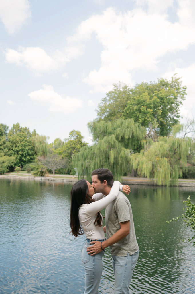 Couples kissing Centennial Park in Nashville.