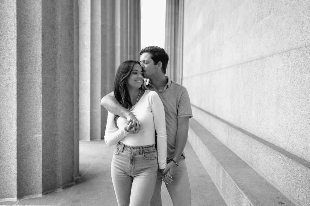 Couple posing at the Parthenon in Centennial Park in Nashville, Tennessee 