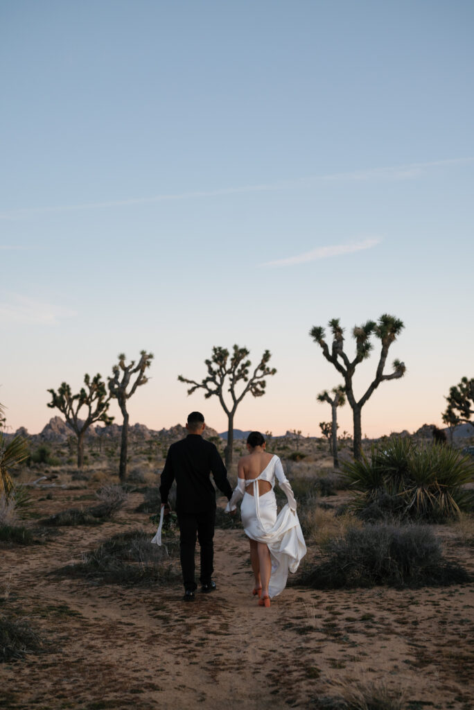 Couple walking at blue hour in Joshua Tree 