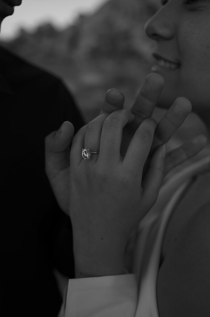 Black and white detail shot of brides ring 
