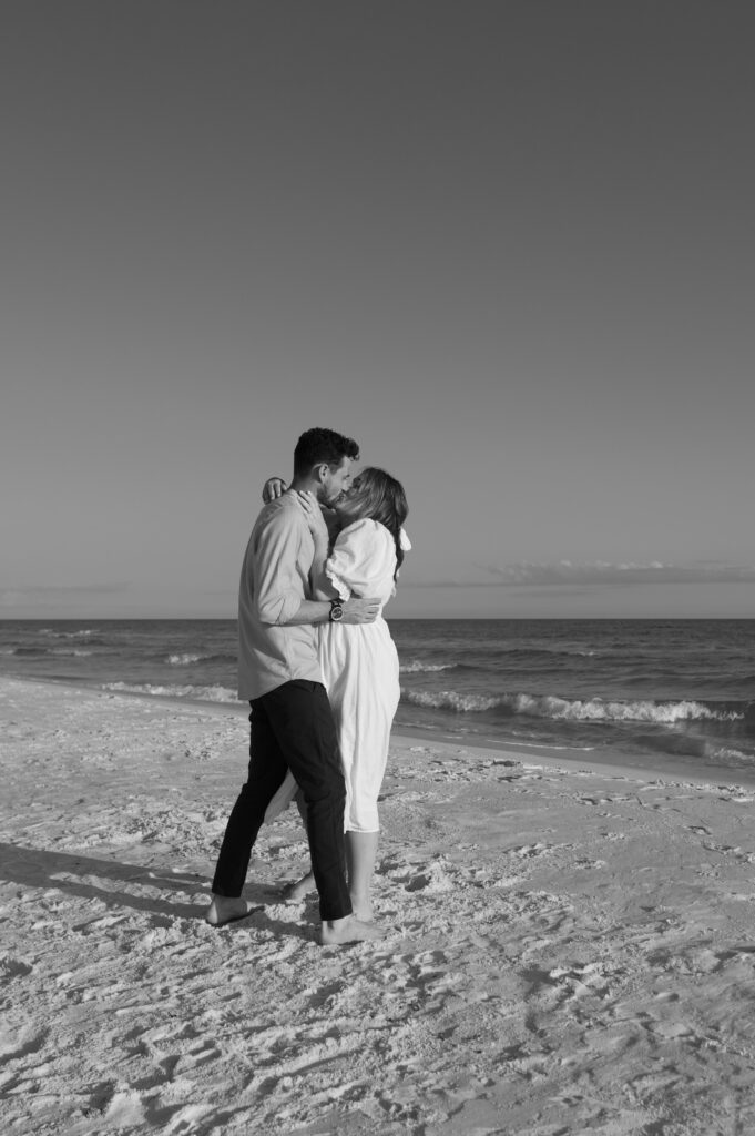 Couple kissing on the beach in Florida 