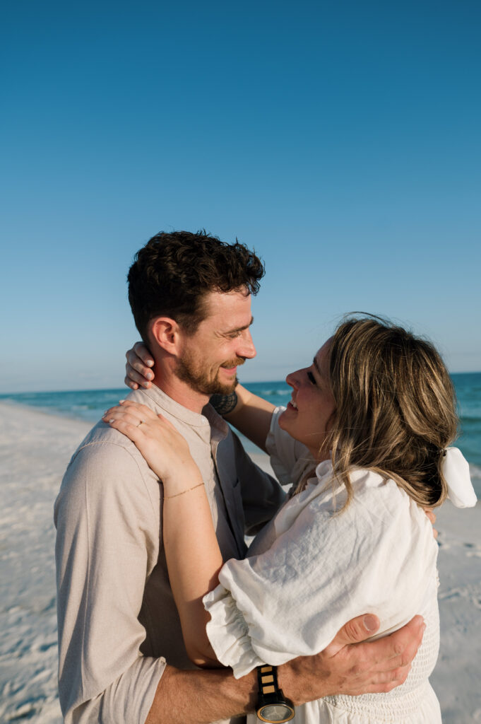 Couple kissing on the beach on Shell Island in Florida 