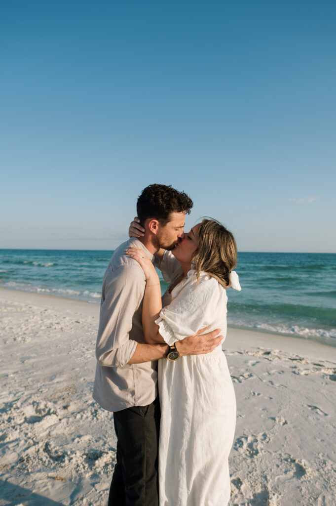 Couple kissing on the beach on Shell Island in Florida 