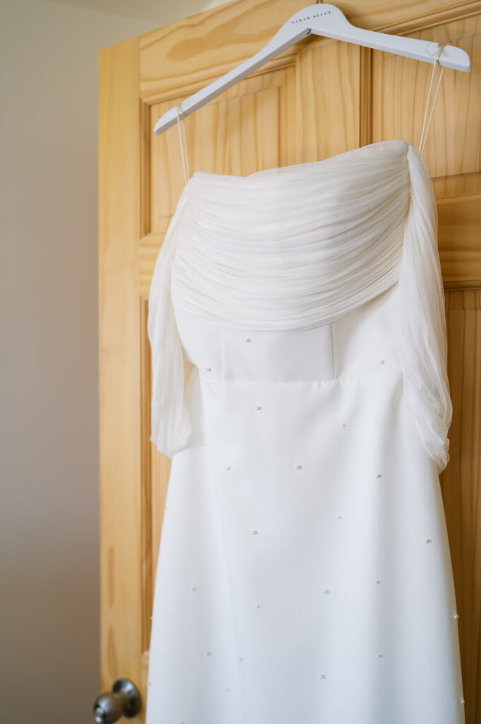 Detail shot of brides Sarah Seven wedding dress