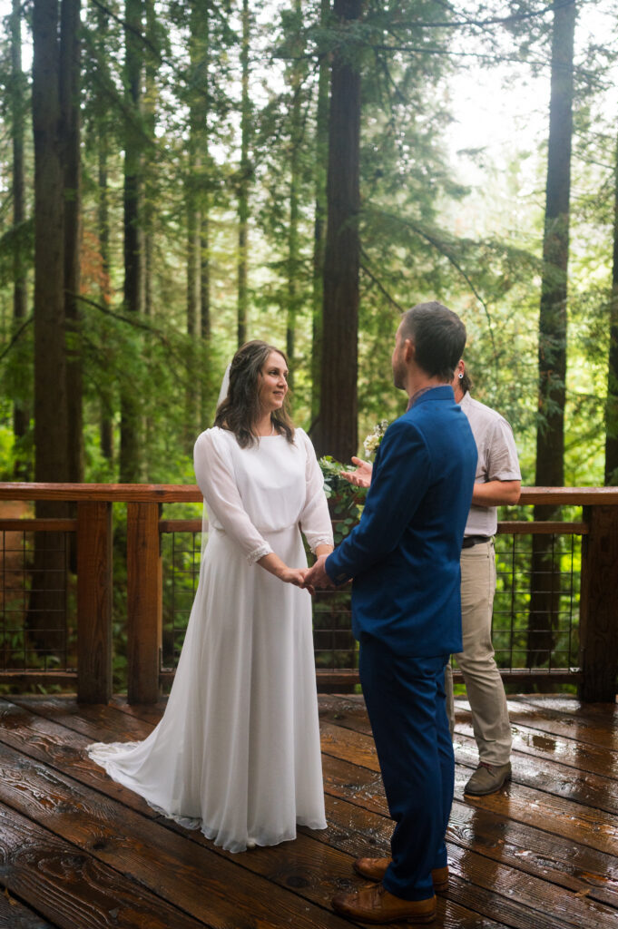 Couple saying their vows at The Redwood Deck at Hoyt Arboretum