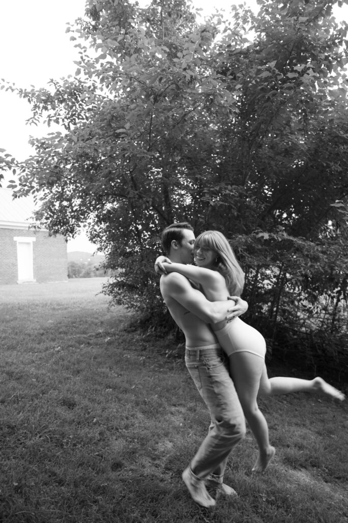 black and white blurry motion shot of couple playing 