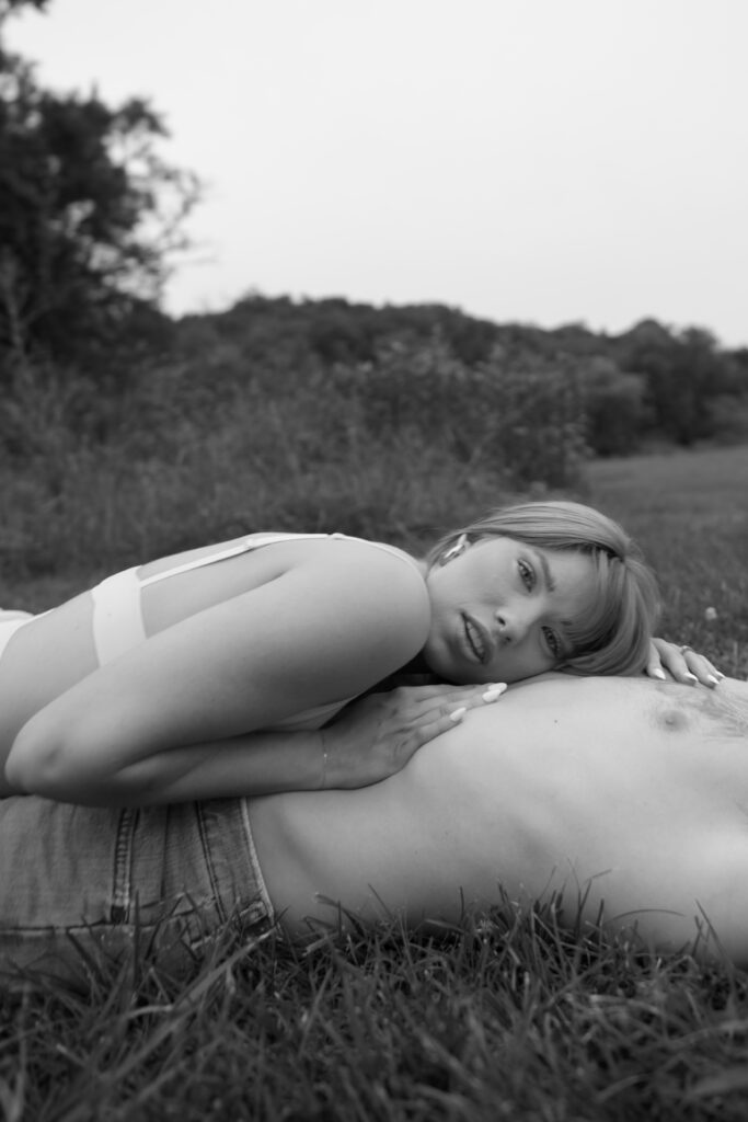 Couple laying on each other in Tennessee for editorial session