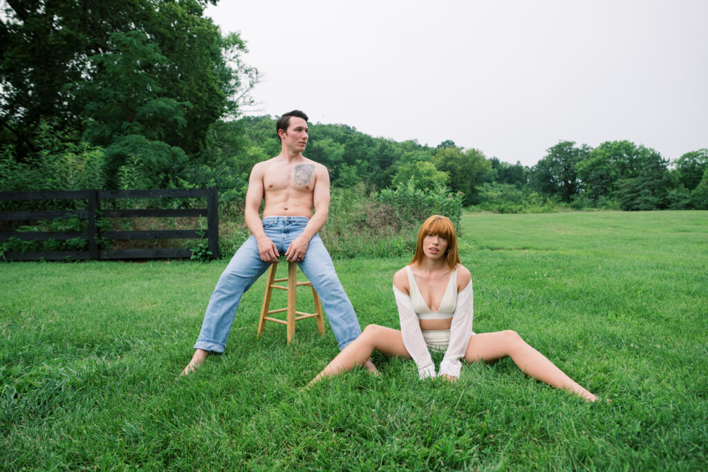 Couple posing in an editorial pose in the hills of Tennessee