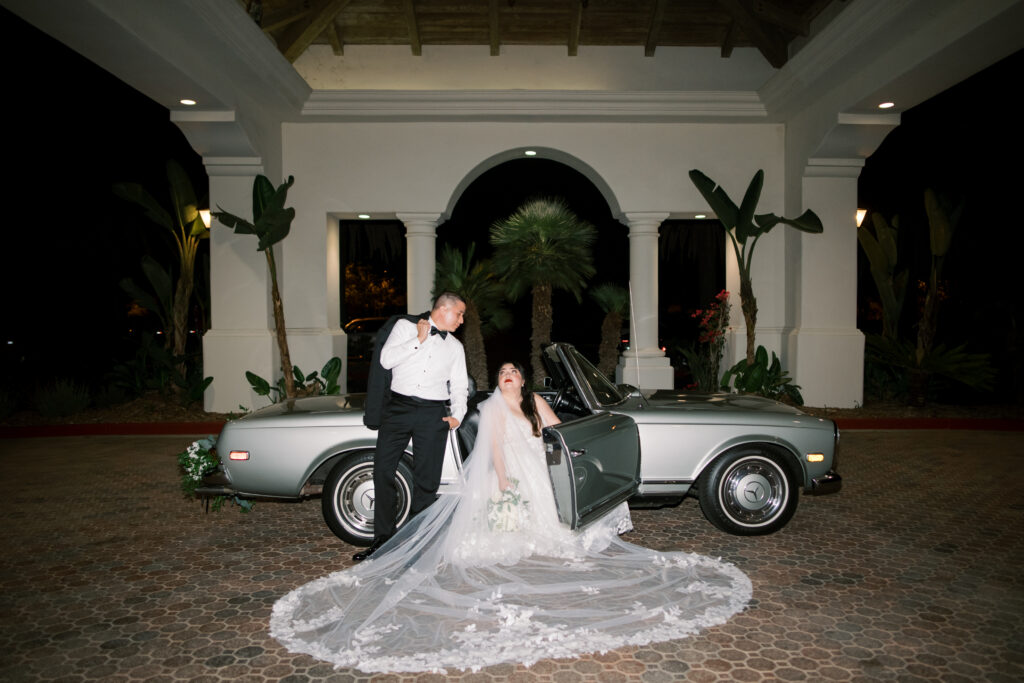 Timeless wedding photography at night with flash and vintage car 