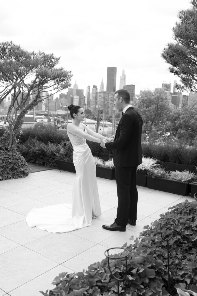 Wedding couples first look at The Foundry in Brooklyn, New York overlooking the skyline