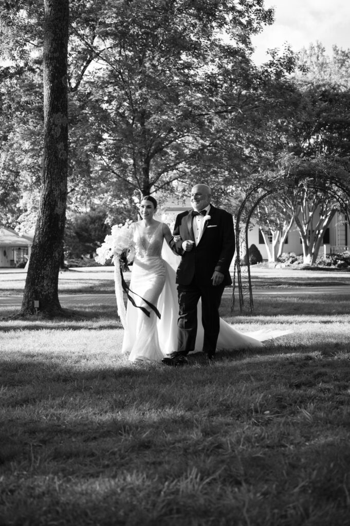 Wedding ceremony in the front lawn  at The Estate at Cherokee Dock in Nashville, Tennessee