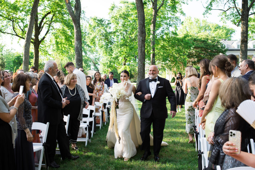 Wedding ceremony in the front lawn  at The Estate at Cherokee Dock in Nashville, Tennessee