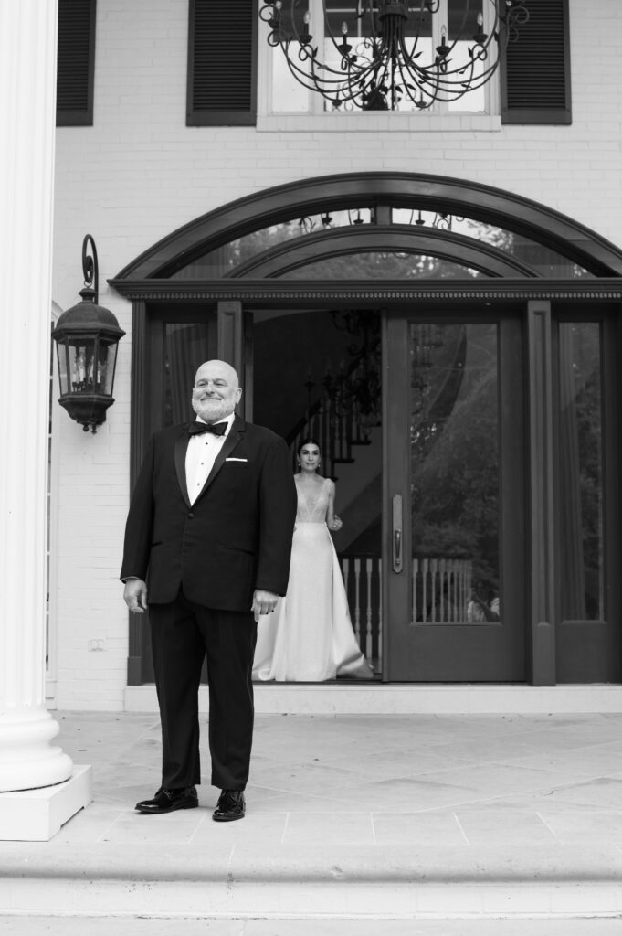 First look with bride and father at Cherokee Dock 