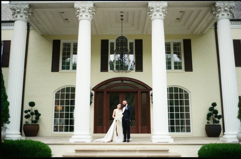 Bride and Groom portraits on the front porch at The Estate at  Cherokee Dock in Nashville