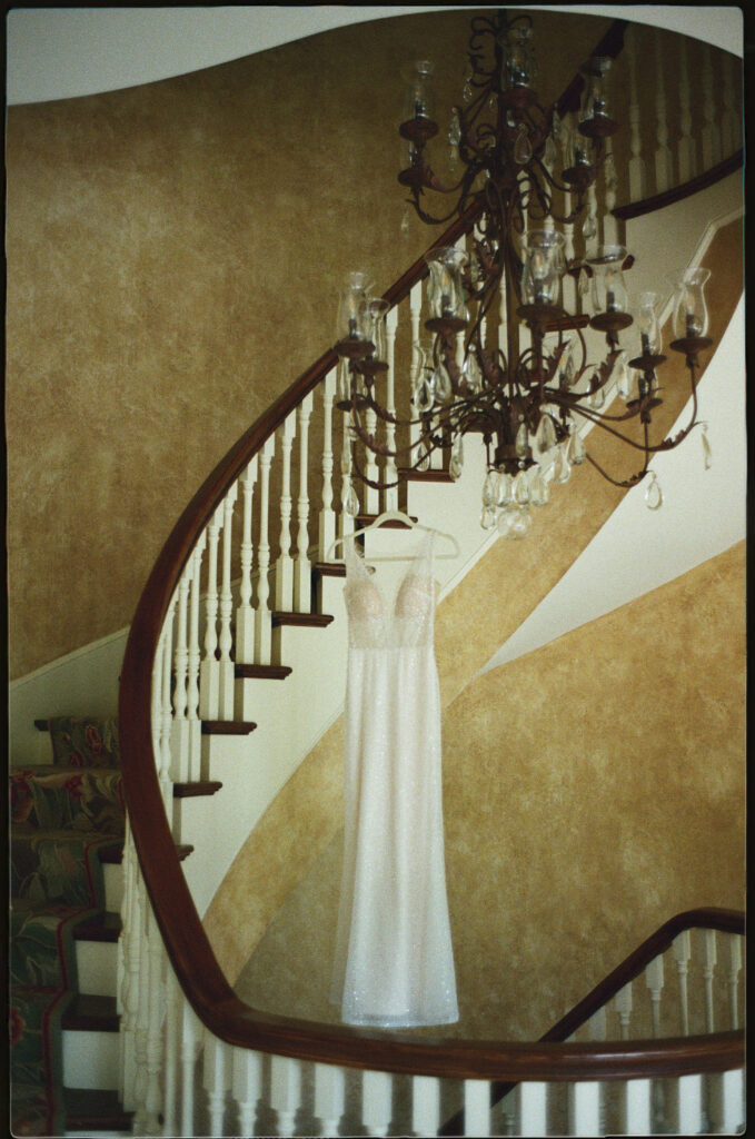 Wedding dress hanging in the foyer at The Estate at Cherokee Dock 
