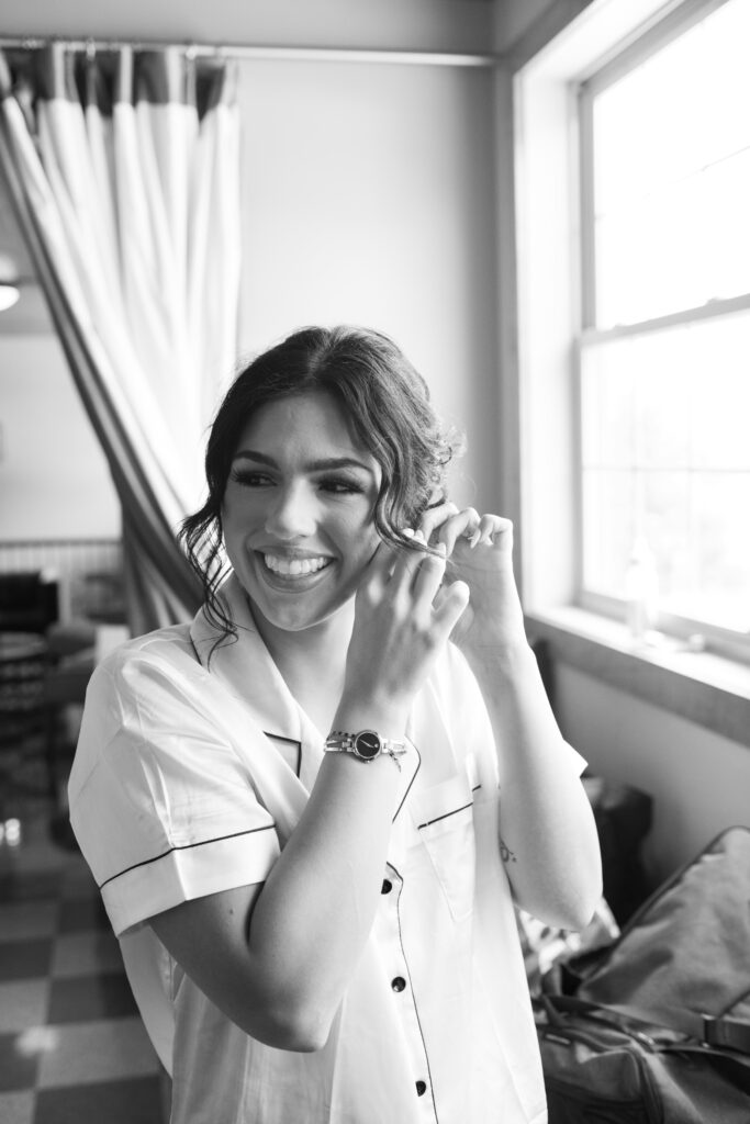 Bride getting ready at her summertime wedding 