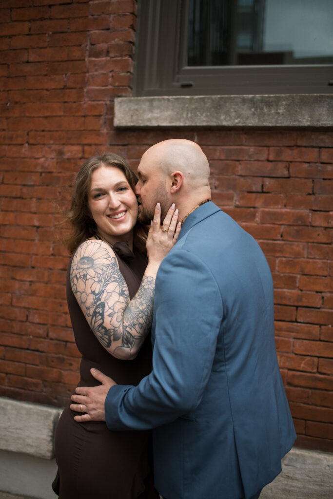 A couple posing in  Printer's Alley