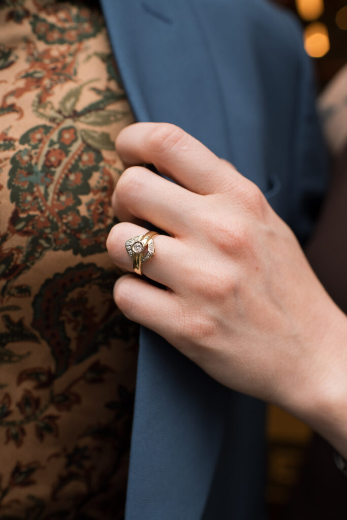 An up-close detail shot of a women's engagement ring