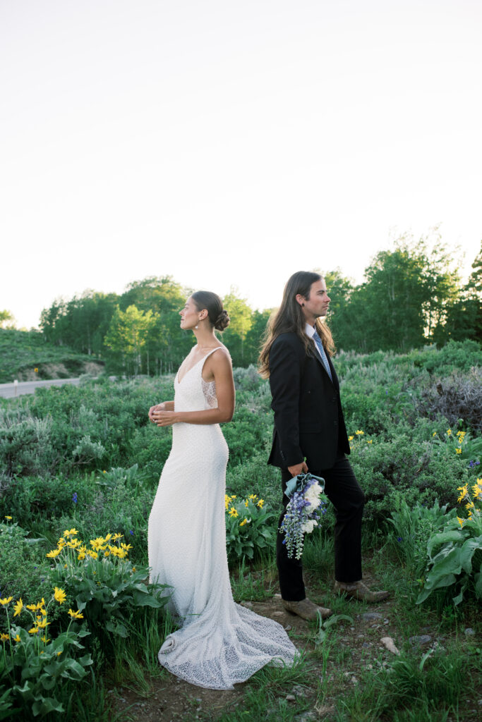 Couple posing for wedding portraits before their elopement in Grand Teton 