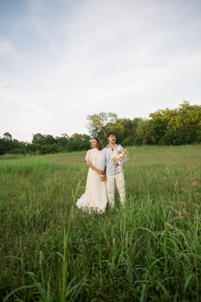 Bride and groom posing for a traditional wedding portraits 