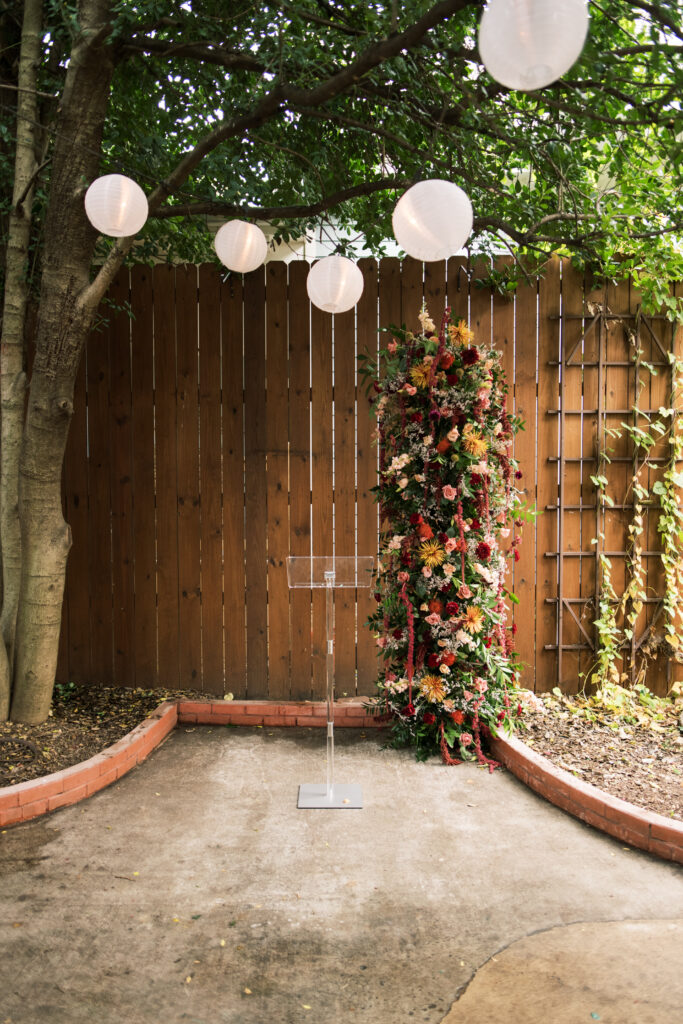 Detail photos of the floral backdrop for an intimate wedding at The Urban Cowboy in Nashville, Tennessee.