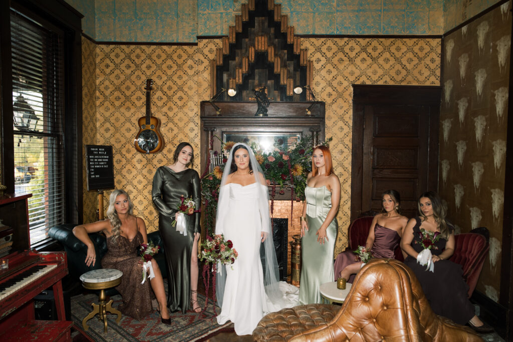 Bride's first look with her bridesmaids inside of The Urban Cowboy in Nashville, Tennessee 