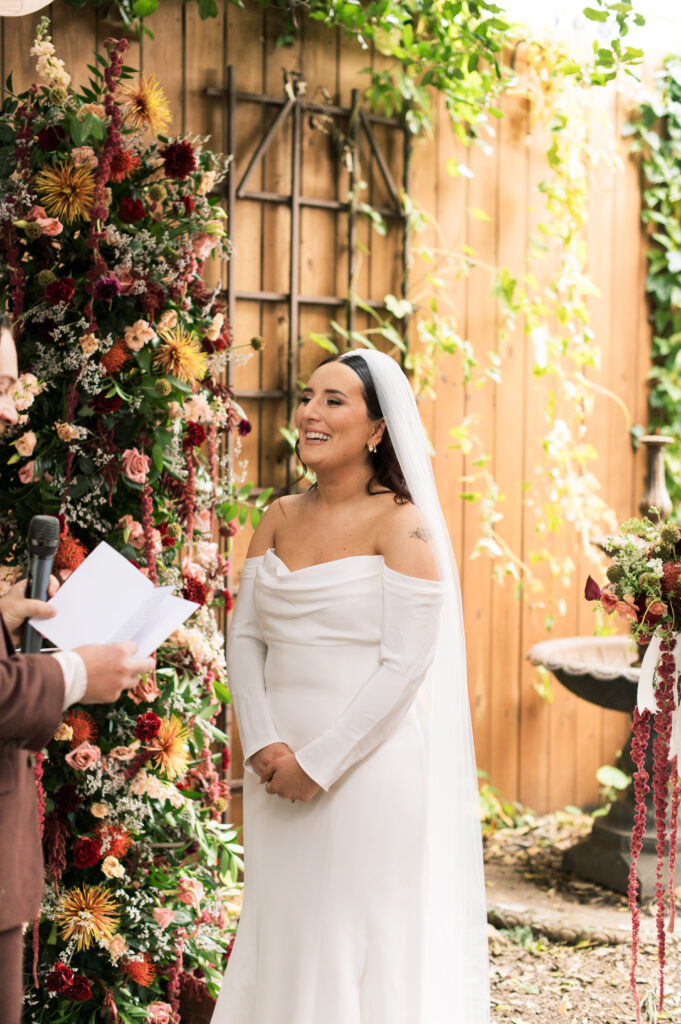 Bride and groom standing at their  intimate wedding ceremony at Urban Cowboy in Nashville, Tennessee.