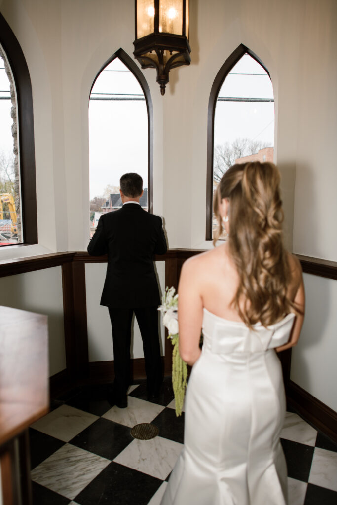 Brides first look with her step dad in The Palomar in Cincinnati, Ohio