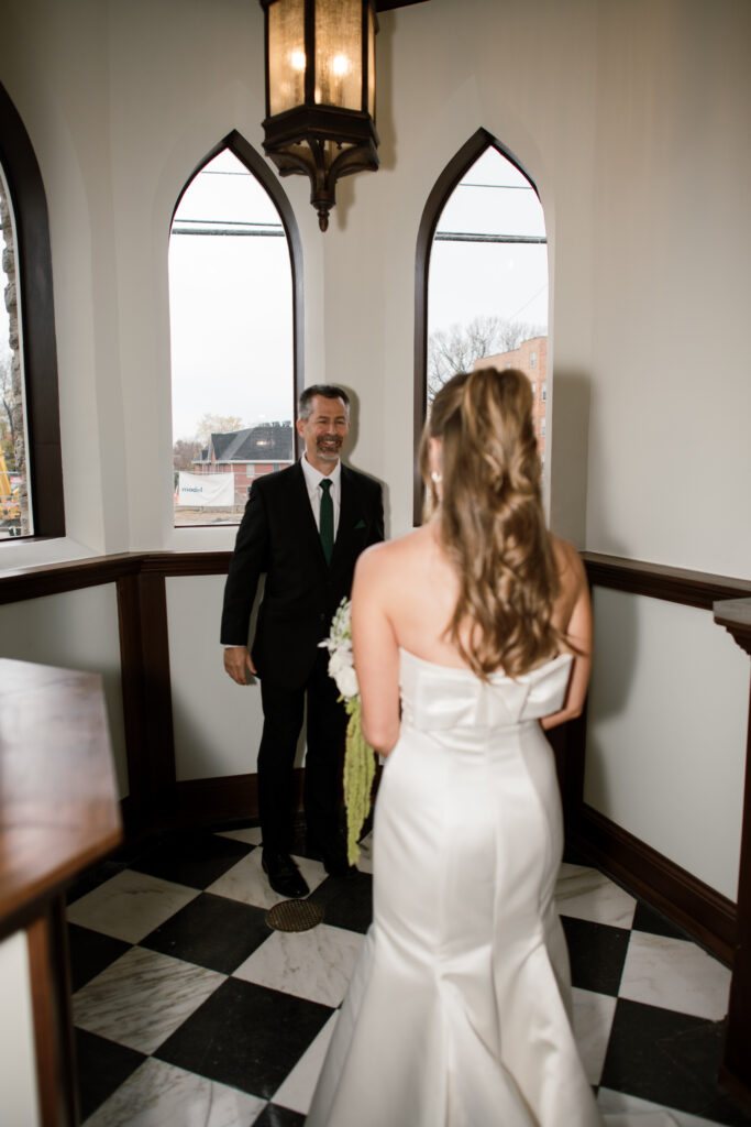 Brides first look with her step dad in The Palomar in Cincinnati, Ohio