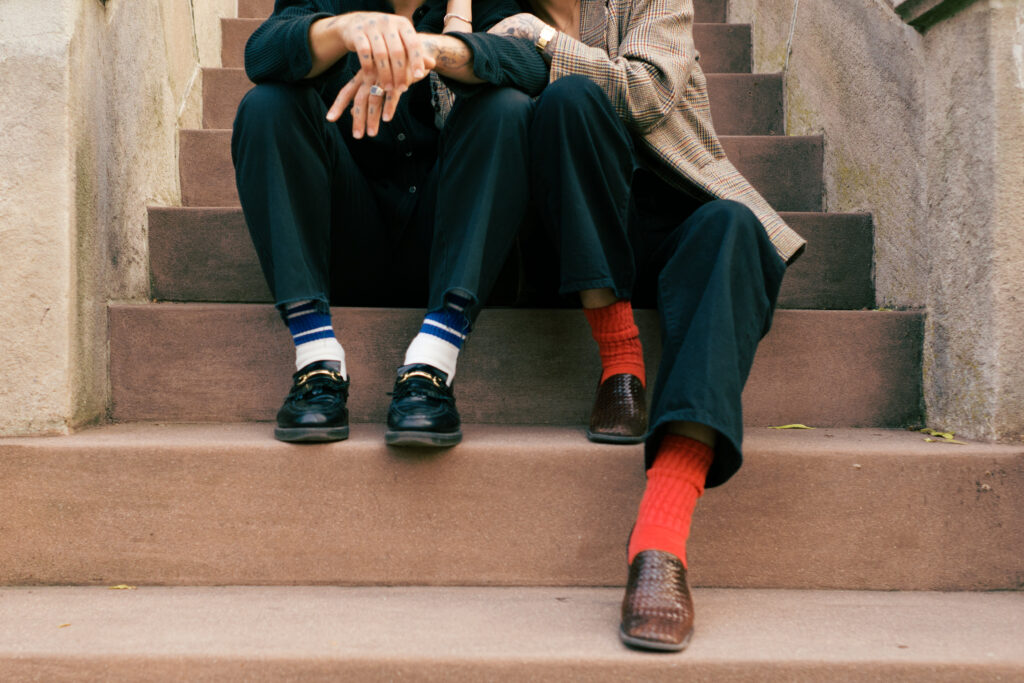 Detail shot of the couples shoes while sitting on the front stoop of a Brooklyn Brownstone during their Engagement session