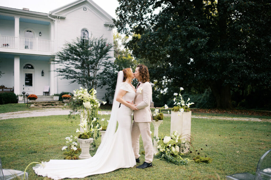Couple kissing at their ceremony space