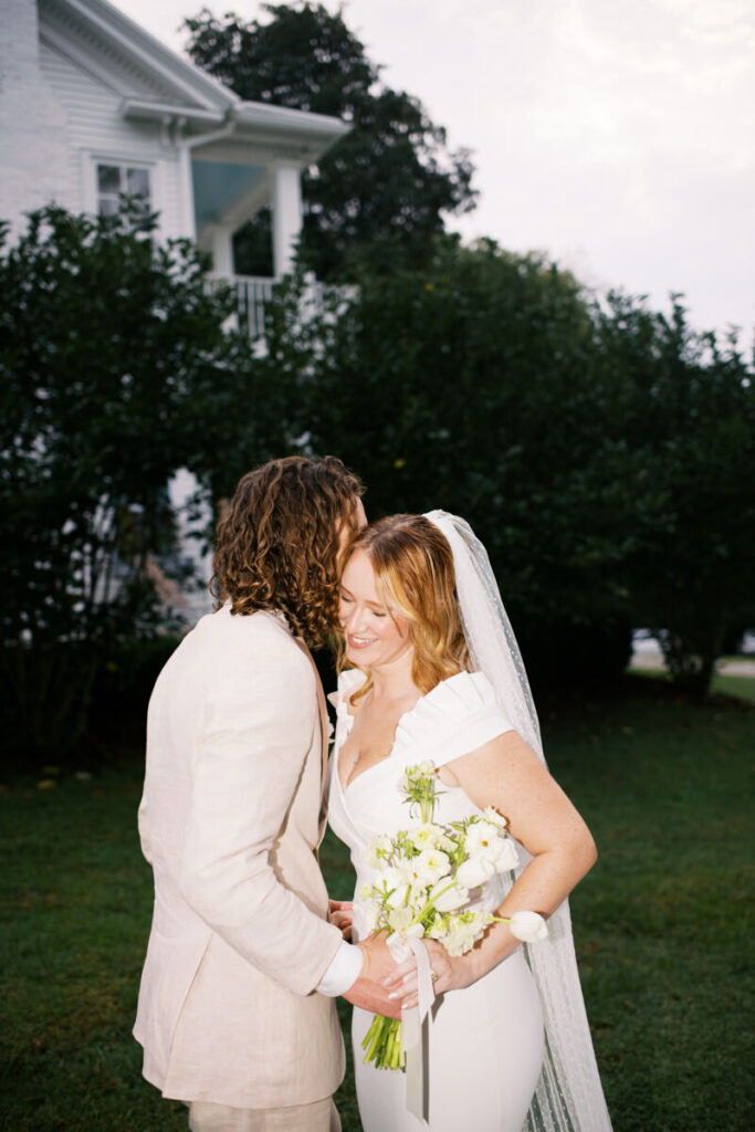 Editorial Wedding Photography of couple dancing in the front yard of their wedding venue in upstate New York